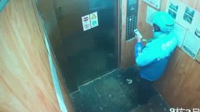 广西南宁一外卖员朝电梯按键吐口水被行拘5日